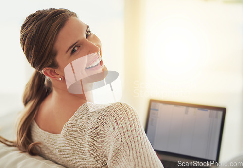 Image of Remote work, laptop and portrait of woman on sofa in home living room. Computer, freelancer and excited face of person from Canada on couch working on project for social media, email or mockup space.