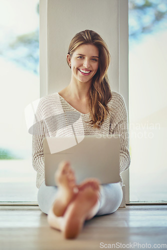 Image of Remote work, laptop and portrait of woman on floor in home working on project. Computer, freelancer and happy face of person typing, writing blog for social media or email, internet and web research