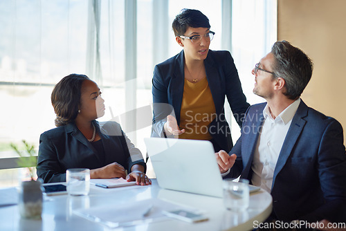 Image of Business, meeting and people in training or working in corporate, discussion with speaker or management. Leadership, team and collaboration on computer or planning, strategy and brainstorming