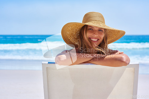 Image of Portrait, beach and woman on a holiday, summer and travel with happiness, relax and getaway with tourism. Face, female person or girl on a chair, seaside vacation and tropical island with destination