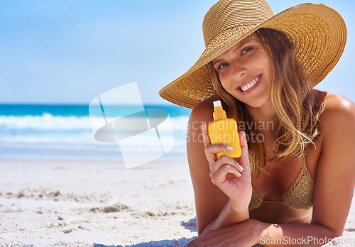 Image of Sunscreen, portrait and happy woman on beach for skincare, cosmetics and beauty health, summer and holiday. Island, tropical and face of model or person relax by ocean, dermatology bottle and product