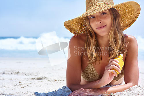 Image of Sunscreen, skincare portrait and woman on beach for beauty, cosmetics and skin health, summer and holiday. Island, tropical and face of model or young person relax by ocean with dermatology product