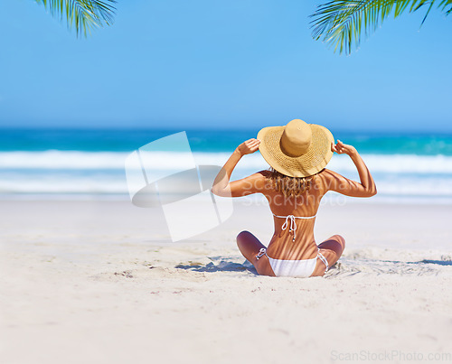 Image of Travel, beach and woman on island for holiday, tropical adventure and vacation in Mauritius. Tropical mockup, ocean and back of female person relax in bikini by sea for tourism, summer and getaway