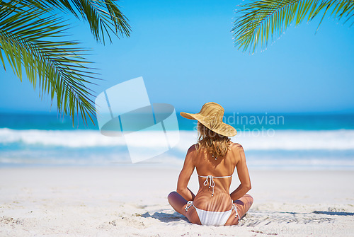 Image of Tropical mockup, beach and back of woman on island on sand for adventure, holiday and vacation in Mauritius. Travel, ocean and female person relax in bikini by sea for tourism, traveling and getaway