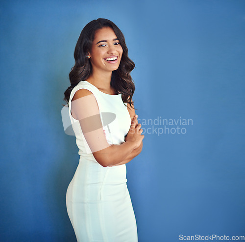 Image of Mockup, smile and portrait of business woman in studio for professional, entrepreneur and mission. Pride, space and empowerment with employee on wall background for creative, arms crossed and career