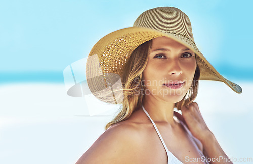 Image of Space, summer and portrait of woman at beach for travel vacation, tropical and relax mockup. Wellness, nature and holiday with face of female tourist and hat at seaside for sunbathing and paradise