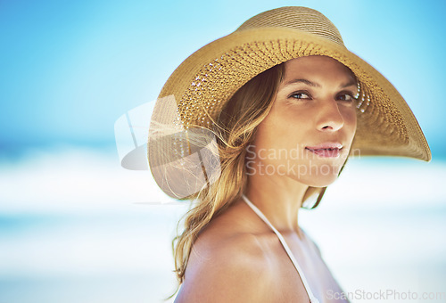 Image of Mockup, summer and portrait of woman at beach for travel vacation, tropical and relax space. Wellness, nature and holiday with face of female tourist and hat at seaside for sunbathing and paradise