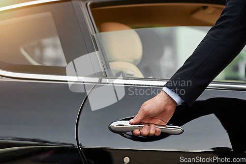 Image of Businessman, hands and chauffeur driver by car door for travel accommodation or commute in the city. Hand of male person on vehicle handle in professional transport service, business class or pick up