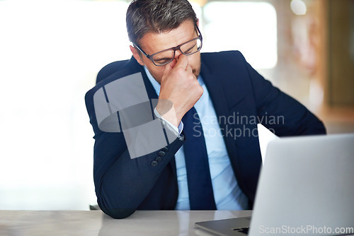 Image of Employee, stress and man with a headache, laptop and anxiety with error, burnout or overworked. Male person, consultant or tired agent with a pc, migraine or internet issue with depression or fatigue
