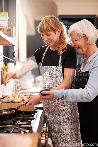 Image of Cooking, grandmother and woman together in kitchen or teach recipe, prepare dinner or lunch with family. Senior mother, girl and happy in apron or home, food and cook with healthy vegetables