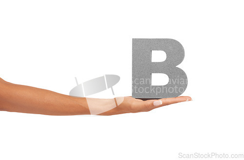 Image of Alphabet, capital letter B and hand in studio for learning font, education and isolated on white background. Closeup woman with grammar character, icon for teaching language and mockup space in palm