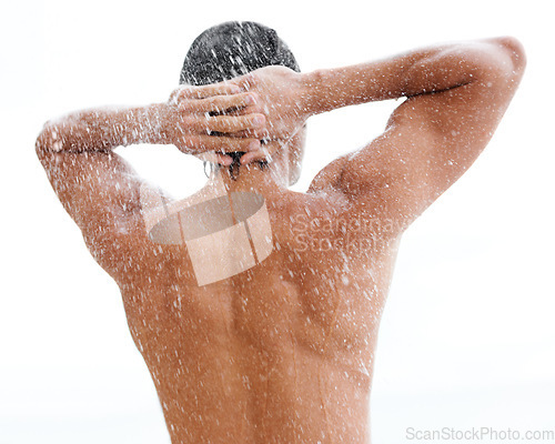 Image of Man, shower and water drop with back, bathroom and hygiene for self care, morning or skin health routine in home. Young guy, body and cleaning with healthy skincare, wellness and beauty in apartment