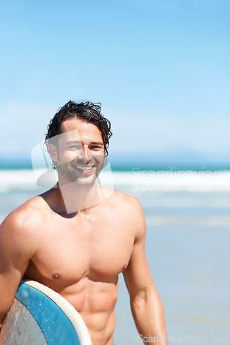 Image of Portrait, surfboard and shirtless man at the beach, ocean and smile for summer vacation, tropical fun and holiday. Happy surfer, muscular male and guy surfing at sea with mockup space on blue sky
