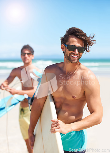 Image of Beach, travel and man surfing friends outdoor together for summer vacation or holiday trip overseas. Surf, sea or fun with a shirtless young male surfer in sunglasses and friend bonding on the coast