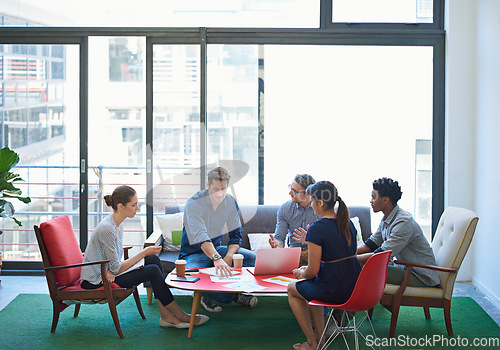 Image of Business people, group and staff for collaboration, creativity and planning in modern office lounge. Startup, men or women in diversity brainstorming ideas for project, teamwork or meeting discussion