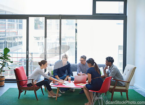 Image of Creative, business people and staff in a meeting, planning and discussion for growth, writing project or collaboration. Writers group, team or partnership with ideas, startup success or brainstorming