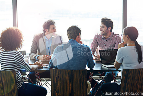 Image of Group, brainstorming and staff in a meeting, planning and consulting with ideas, opinion and feedback. Coworkers, team and men with women, review and discussion with company development and growth