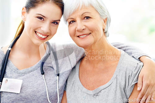 Image of Smile, portrait of caregiver and elderly woman in nursing home, trust and support with doctor. Retirement, healthcare service and face of nurse with patient, happiness and medical check in house.