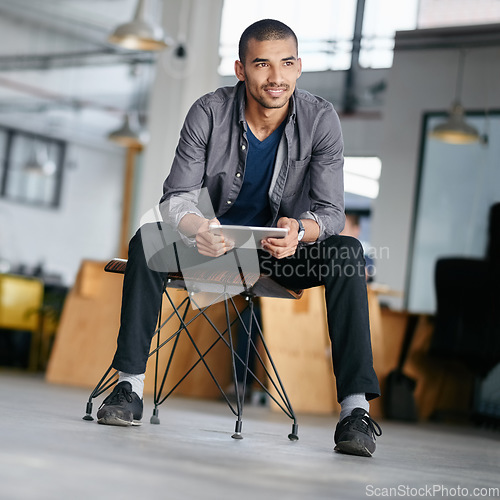 Image of Tablet, thinking and a man designer sitting in his for a creative idea or inspiration while searching online. Technology, research and design with a young male employee using the internet at work