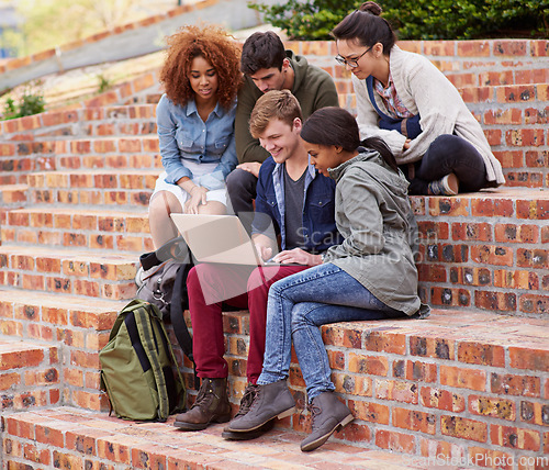 Image of Computer, studying and group of people outdoor for university learning, teamwork and collaboration on stairs. Happy diversity students, youth or friends on college campus, laptop and online education