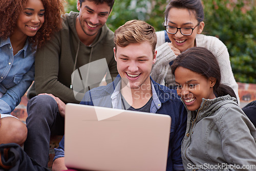 Image of Computer, laughing and group of students outdoor in university learning, teamwork and studying for scholarship. Happy diversity people, youth or friends on college campus, laptop and online education