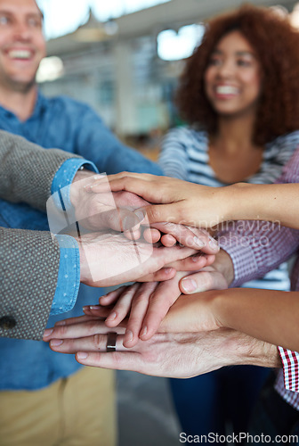 Image of Success, teamwork or hands of business people in stack for mission goals, collaboration or support. Team building, blurry or happy employees in meeting with smile, solidarity or motivation together