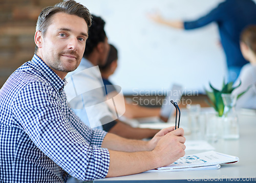 Image of Project meeting, employee portrait and confident man listen to presentation, report or sales growth plan. Collaboration, career or business people, office person or team work on franchise development