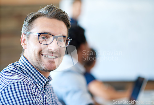 Image of Face, portrait of a businessman and in a modern conference room of his workplace with a smile. Health wellness or happiness, business meeting and professional male person in a boardroom at his work