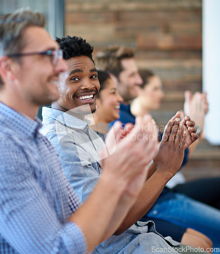 Image of Diversity, colleagues with applause and in a meeting room of their workplace for happiness. Achievement or success, support and coworkers clapping together at workshop or seminar in a boardroom