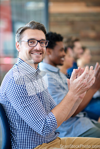 Image of Audience portrait, applause and happy man, business people or group at presentation, conference or trade show. Smile, celebration and row of corporate team, staff or businessman clapping for speaker