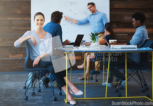 Image of Project meeting, employee portrait and happy woman listening to speaker presentation, report or sales growth plan. Cooperation, smile and office people, group or team work on franchise development