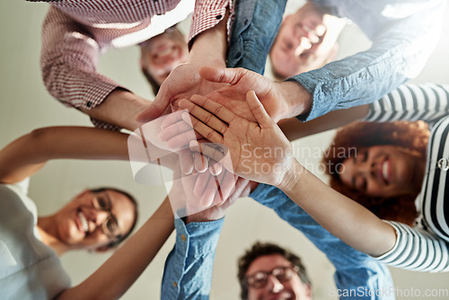 Image of Portrait, hands and staff together, stack and collaboration with team building, support and solidarity. Face, group and coworkers with teamwork, partnership and motivation with success and growth