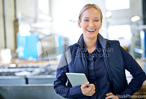 Image of Tablet, happy and portrait of woman in factory for manufacturing, networking and inventory. Distribution, industrial and technology with female employee in warehouse for inspection, export or storage