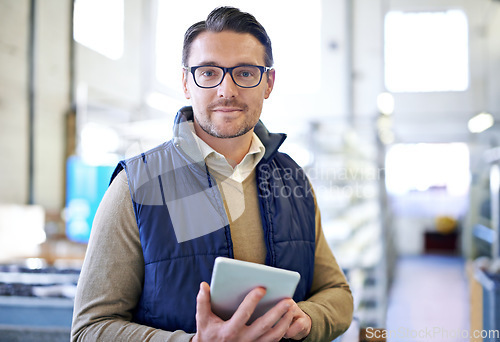 Image of Tablet, serious and portrait of man in factory for manufacturing, networking and inventory. Distribution, industrial and technology with male employee in warehouse for inspection, export and storage