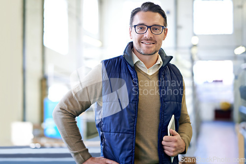 Image of Tablet, happy and portrait of man in factory for manufacturing, networking and inventory. Distribution, industrial and technology with male employee in warehouse for inspection, export and storage