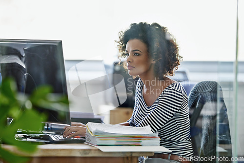 Image of Computer, focus and business woman in office for research, creative and planning.Thinking, professional and technology with female employee on digital agency for startup, email and website designer