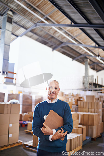 Image of Delivery, smile and portrait of man in warehouse for cargo, storage and shipping. Distribution, ecommerce and logistics with employee in factory plant for supply chain, package or wholesale supplier