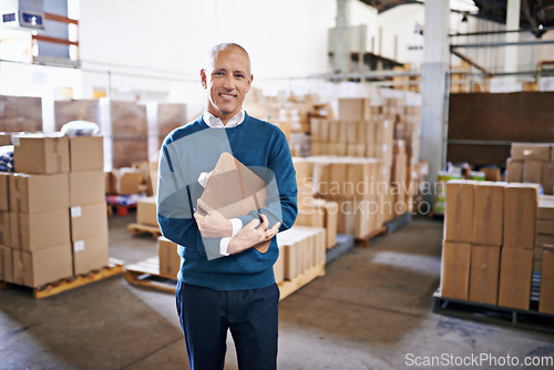 Image of Checklist, smile and portrait of man in warehouse for cargo, storage and shipping. Distribution, ecommerce and logistics with employee in factory plant for supply chain, package or wholesale supplier