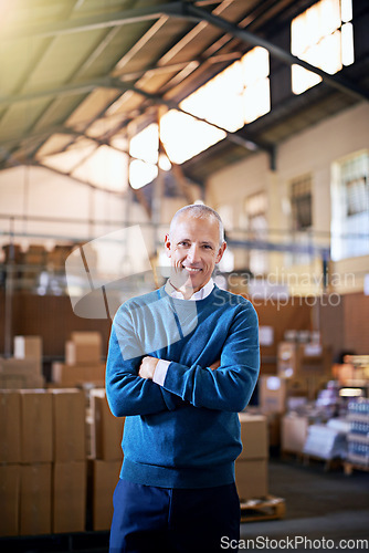 Image of Happy, arms crossed and portrait of man in warehouse for cargo, storage and shipping. Distribution, ecommerce and logistics with employee in factory for supply chain, package or wholesale supplier