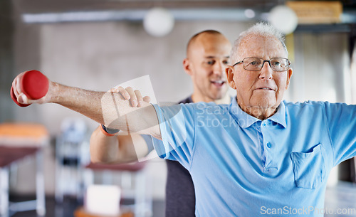 Image of Physiotherapist, senior man and weight training for health and wellness therapy in retirement. Healthcare, physio and workout for recovery with a dumbbell for medical excuse and elderly male person