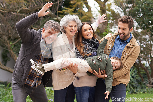 Image of Happy family, child and portrait of people playing with kid in a park on outdoor vacation, holiday and excited together. Grandparents, happiness and parents play as love, care and bonding in nature