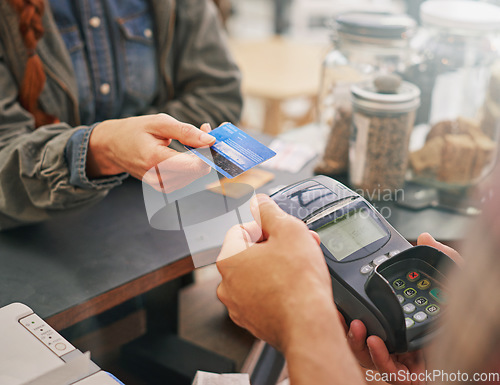 Image of Credit card, debit machine and customer in cafe with hands of cashier for shopping, point of sale and checkout. Payment technology, bills and closeup of person paying for finance in restaurant store