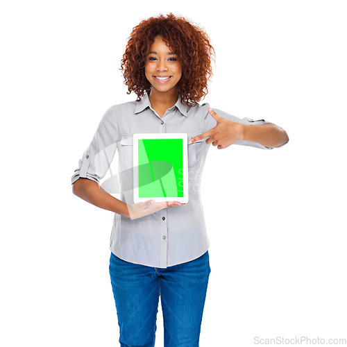 Image of Woman, pointing and green screen tablet in studio for social media app, review and mockup by white background. Isolated african lady, model and portrait for web design job, space and smile for promo