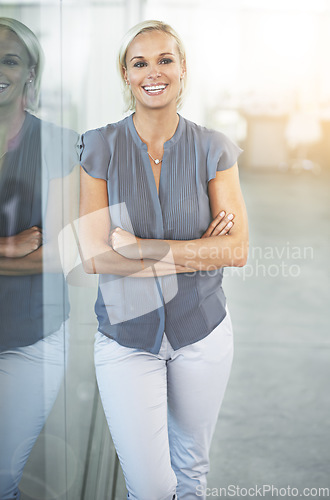 Image of Proud, smile and thinking business woman confident in working for a company or real estate agency office. Success, goals and professional or employee arms crossed happy for property development