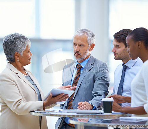 Image of Ceo, tablet and teamwork with business people in meeting for coaching, mentor and strategy. Corporate, leadership and project management with employees in office for boss, training and director