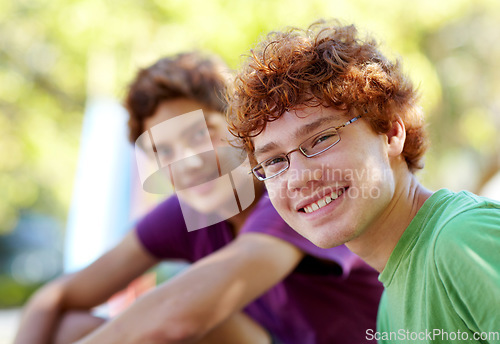 Image of Portrait, children and friends in a park together during summer for bonding outdoor on holiday. Friendship, kids or boys with a young child and best friend outside in the day on a blurred background