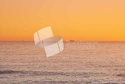 Image of Sky, sunset and sea at night on the horizon with ocean and waves landscape. Sunrise background, calm weather and summer by the beach with coastline and outdoor environment with mockup in nature