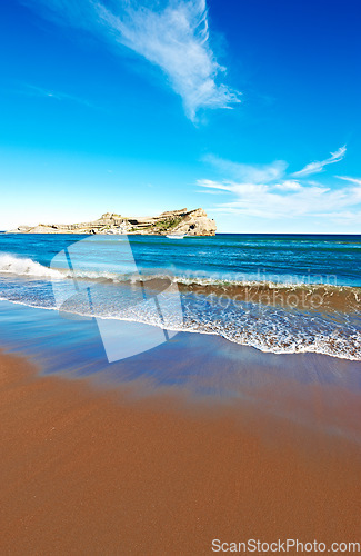 Image of Ocean, waves with blue sky and landscape, beach and travel, sand and summer vacation outdoor in Hawaii. Environment, horizon and seaside location, tropical destination and journey with mockup space