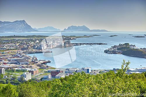 Image of Aerial, coastline and city by ocean in South Africa for tourism, traveling and global destination. Landscape, background and scenic view of sea by buildings in town for nature, vacation and holiday