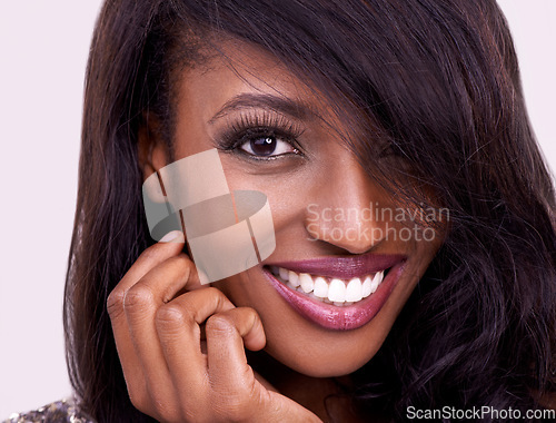 Image of Teeth smile, face and black woman with beauty, makeup and cosmetics on studio background. Happy african female model headshot for facial shine, skin glow and luxury or glamour aesthetic for self care
